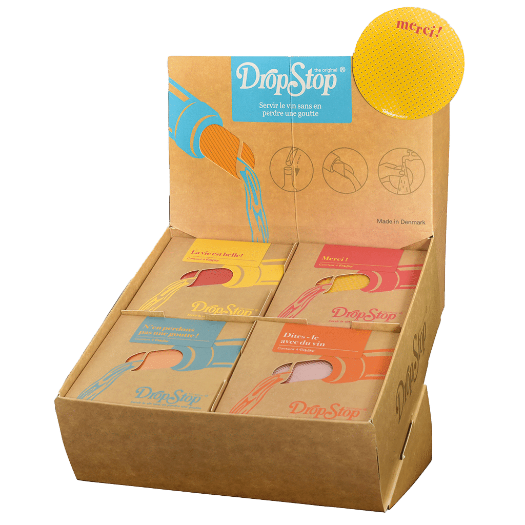 Présentoir carton Drop Stop® “Pop” contenant des disques anti-goutte au design coloré – édition caviste pensée pour la vente en point de vente